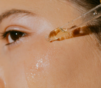 Applying oil around the eyes