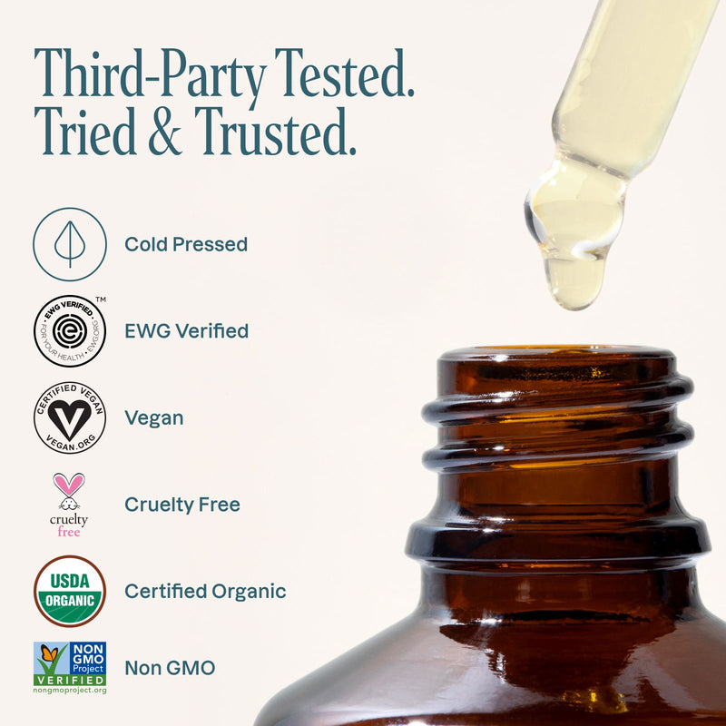 Brown glass bottle with dropper and certification logos on a white background