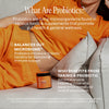 Person wearing an orange shirt with text about probiotics on a gray background