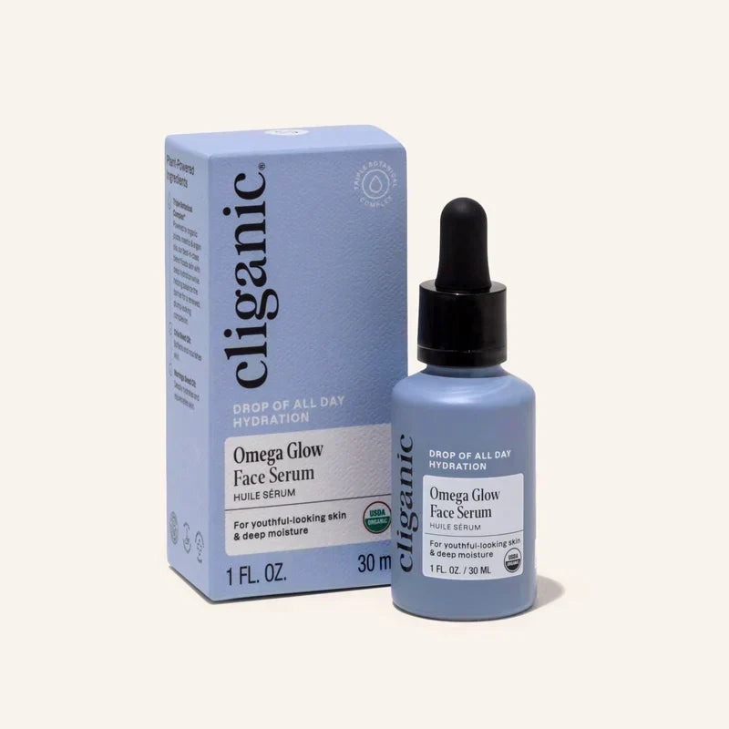 Cliganic Organic Omega Glow Face Serum displayed beside its product box, highlighting the lightweight facial serum packaging.