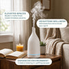 White ceramic aromatherapy diffuser in a cozy living room setting