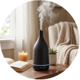 Black ceramic aromatherapy diffuser with essential oils and home décor