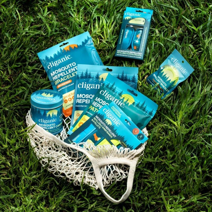 Cliganic natural mosquito repellent collection with DEET-free bracelets, patches, and candles for outdoor protection.