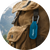 Cliganic Refillable Mosquito Repellent Clip securely attached to a backpack for outdoor mosquito protection.