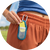 Cliganic Refillable Mosquito Repellent Clip attached to a waistband for convenient, wearable mosquito protection.