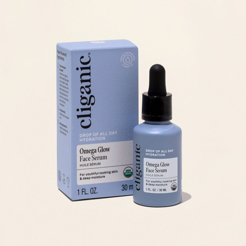 Omega Glow Face Serum bottle with dropper displayed against a light background.