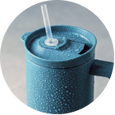 Top view of blue tumbler lid showing sealed drinking spout and leakproof design.